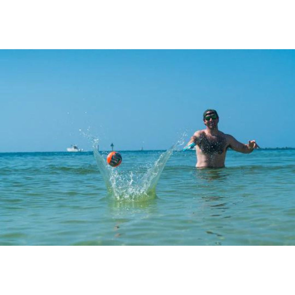Man Throwing Ball with Mini Lacrosse Set