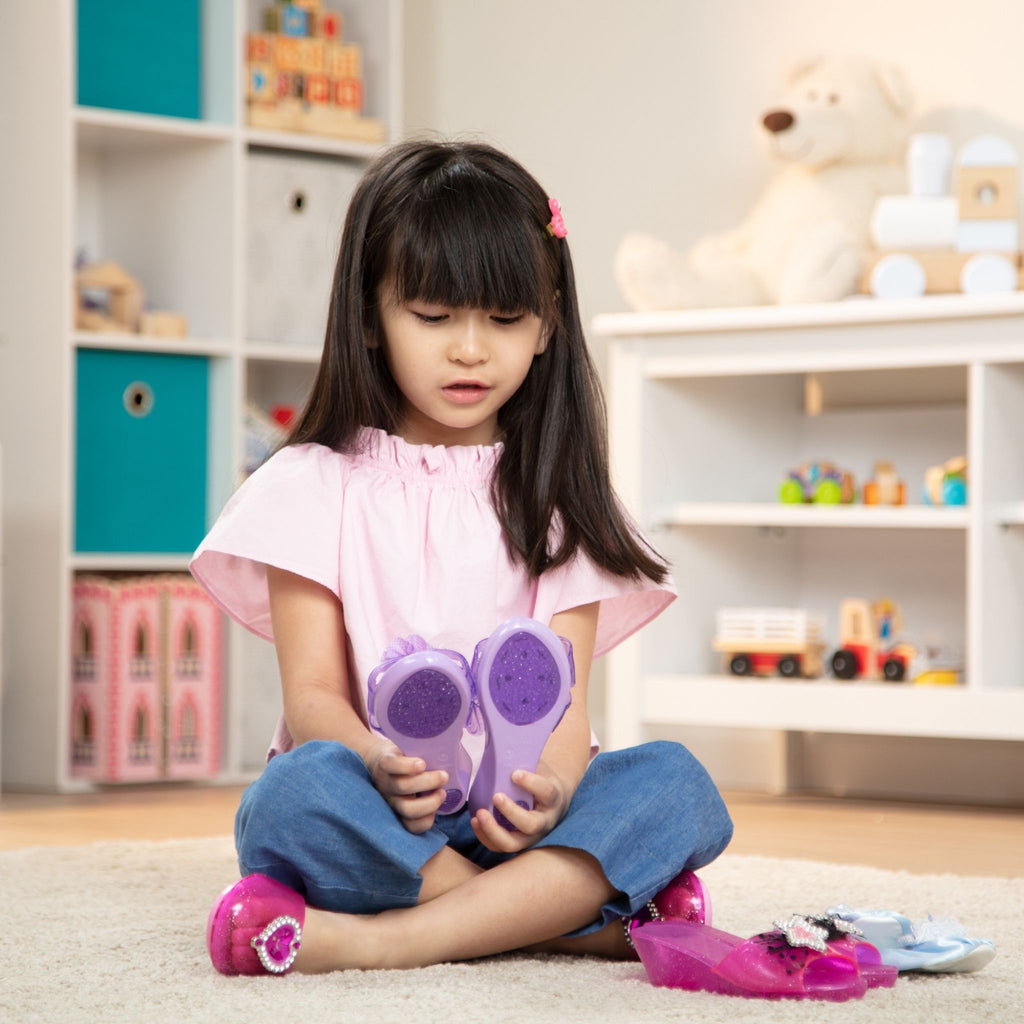 Girl Playing with Dress-Up Shoes