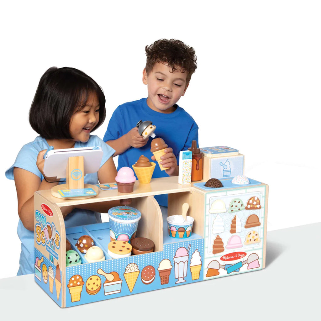 Two children playing with Cool Scoops Ice Creamery
