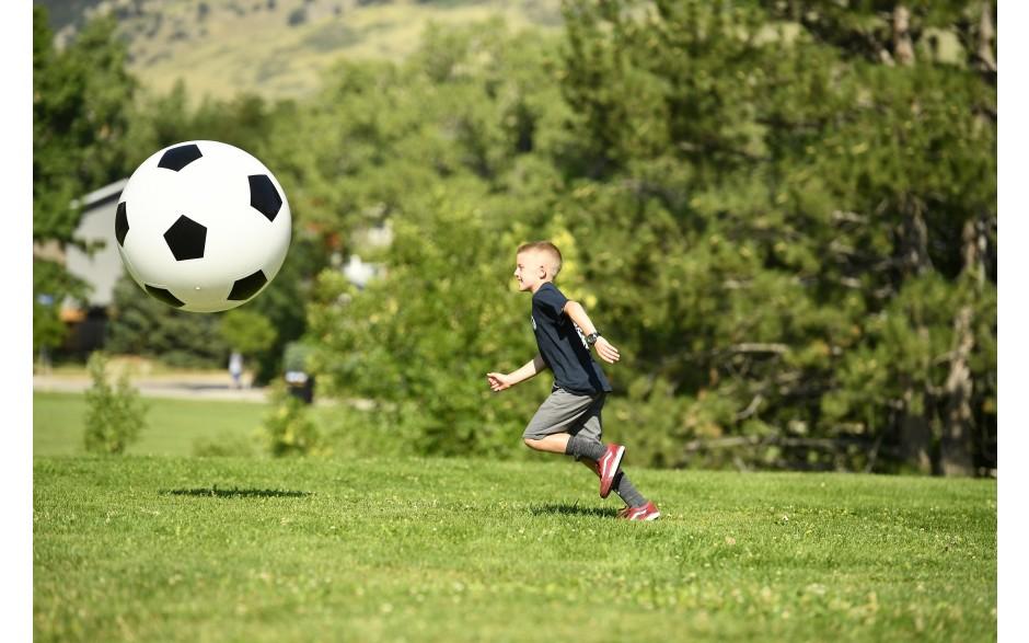 Child playing with Jumbo Soccer Bounce Ball