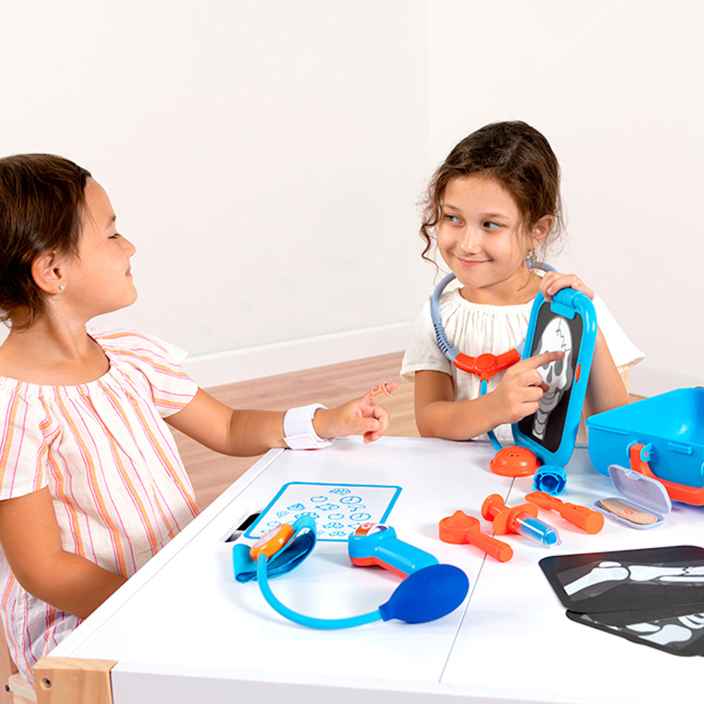 Children playing with Pretendables Doctor Set