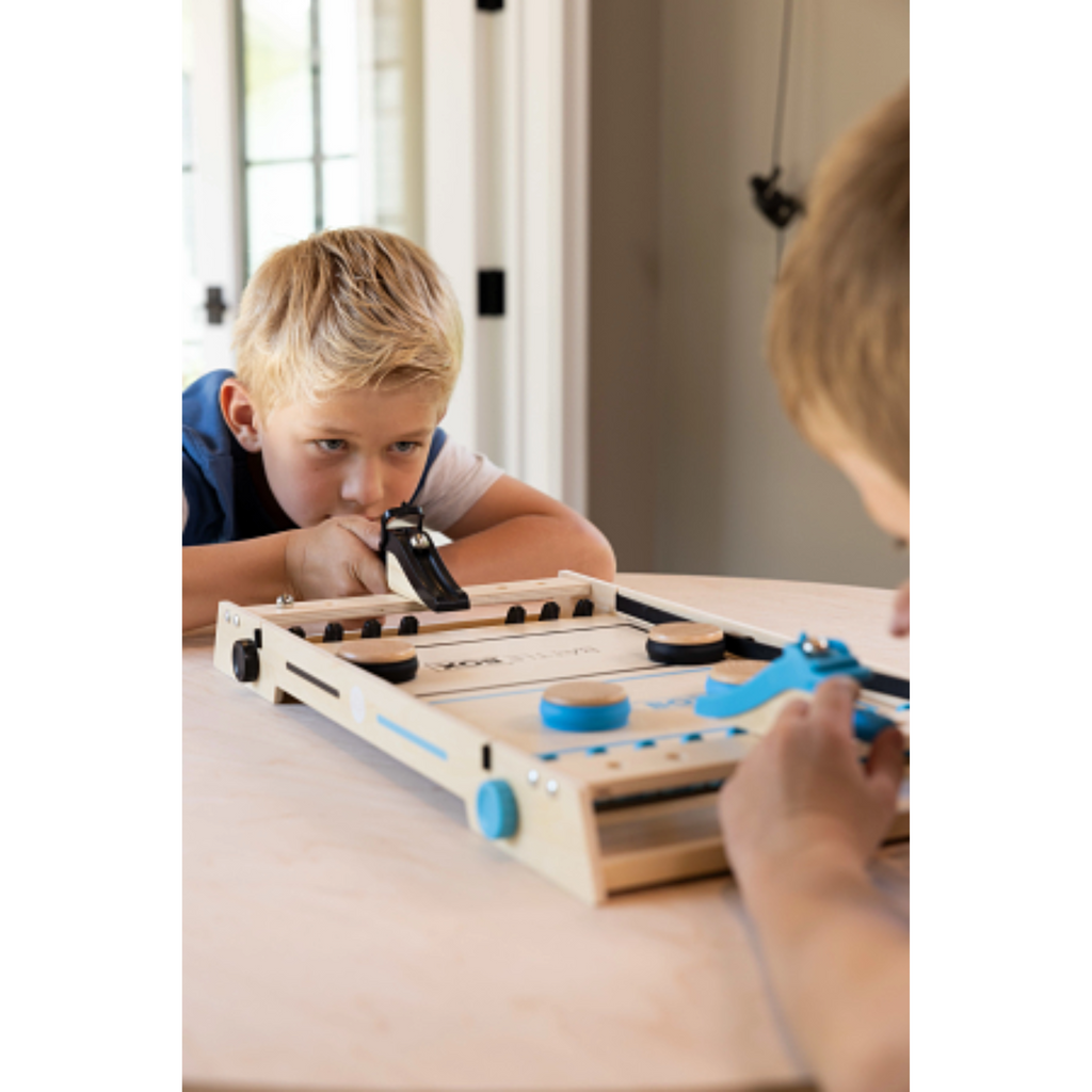 Two children playing with Battle Box game