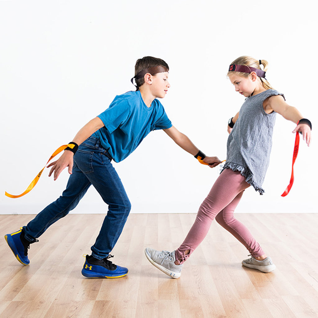 2 kids playing Ribbon Ninja