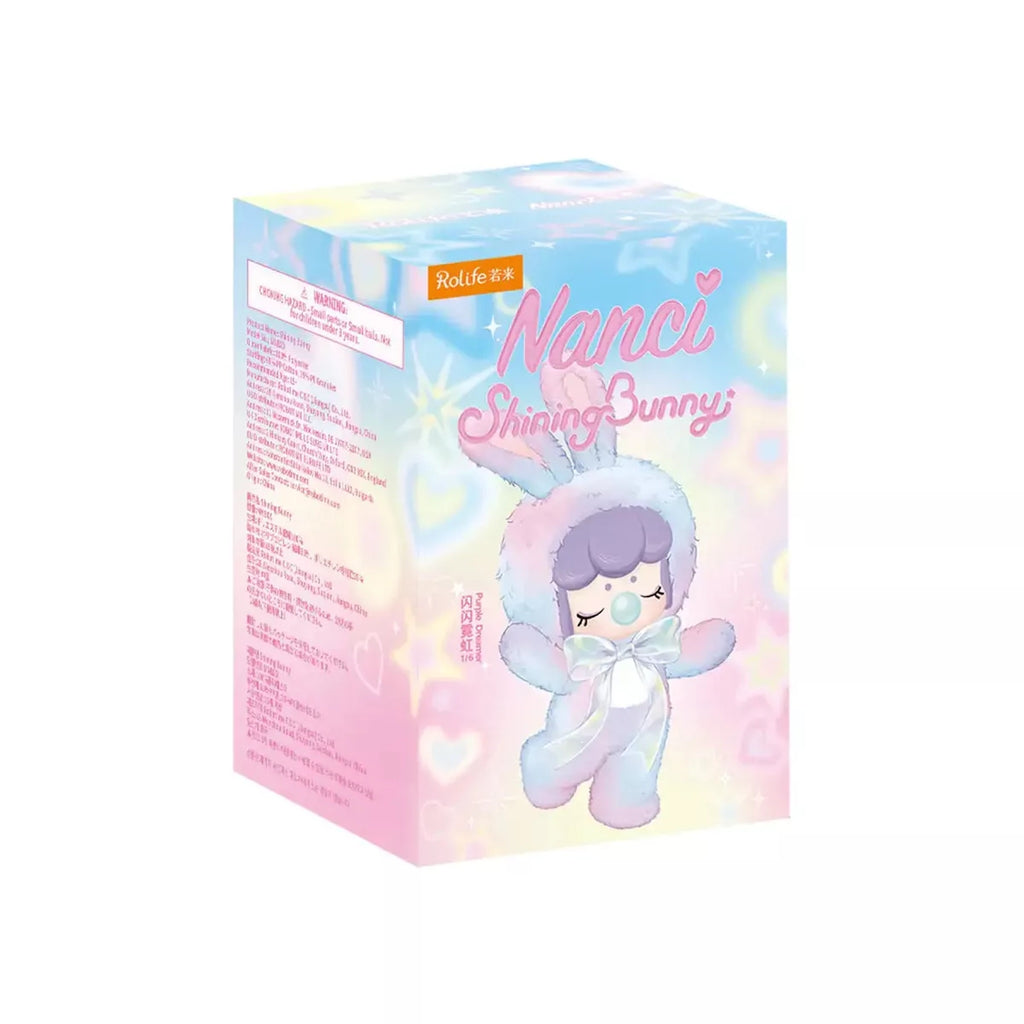 Box of Nanci Shining Bunny toy with pastel colors and character illustration.