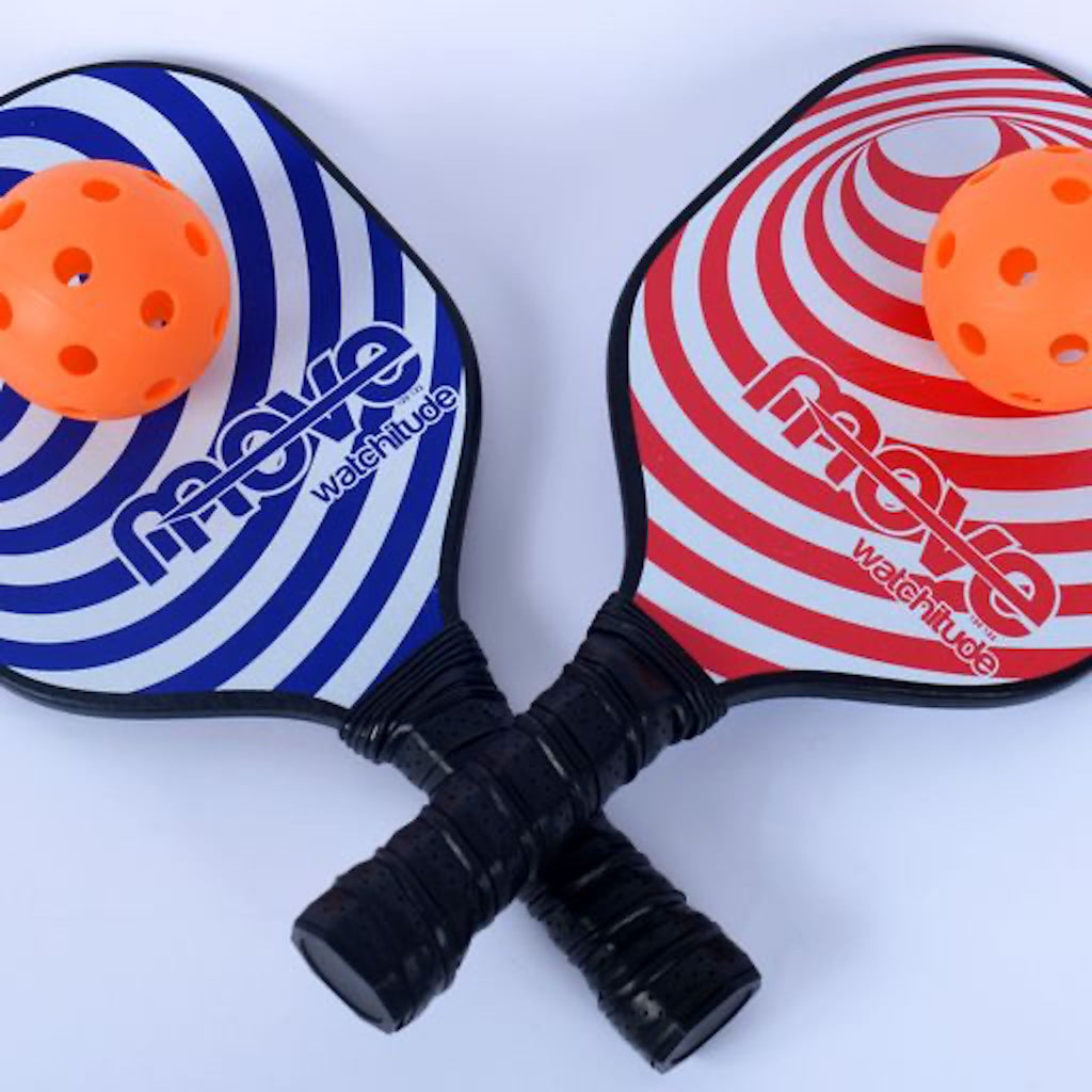 Kids Indoor Pickleball Paddles criss crossed with balls on paddles
