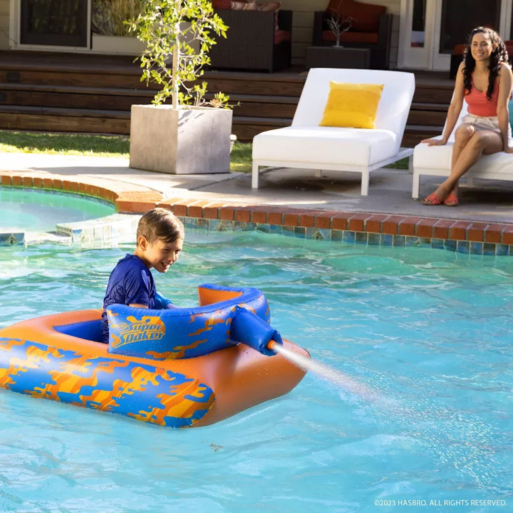 Child playing with NERF MegaForce Battle Tank in pool