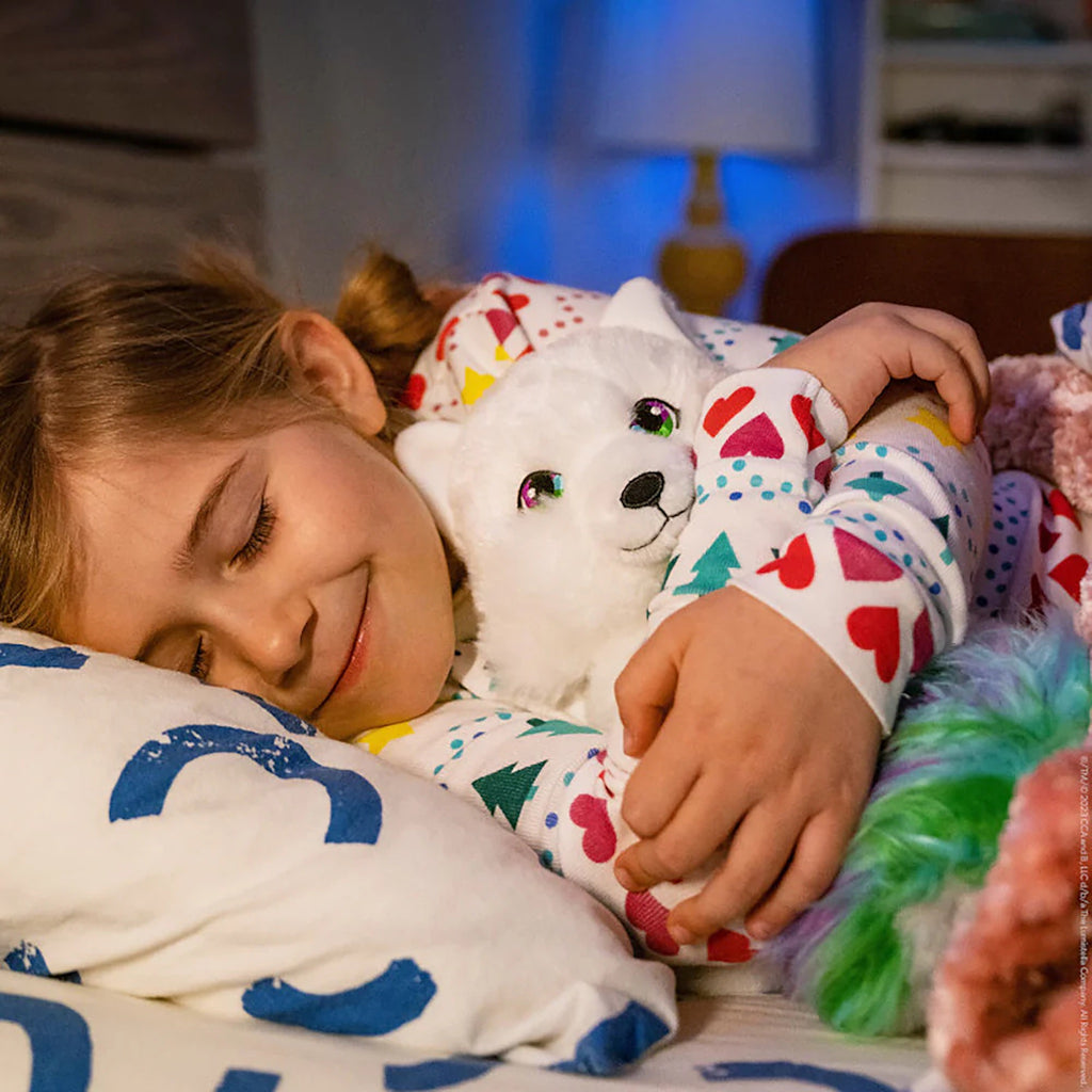 Child Cuddling with Noorah Plush