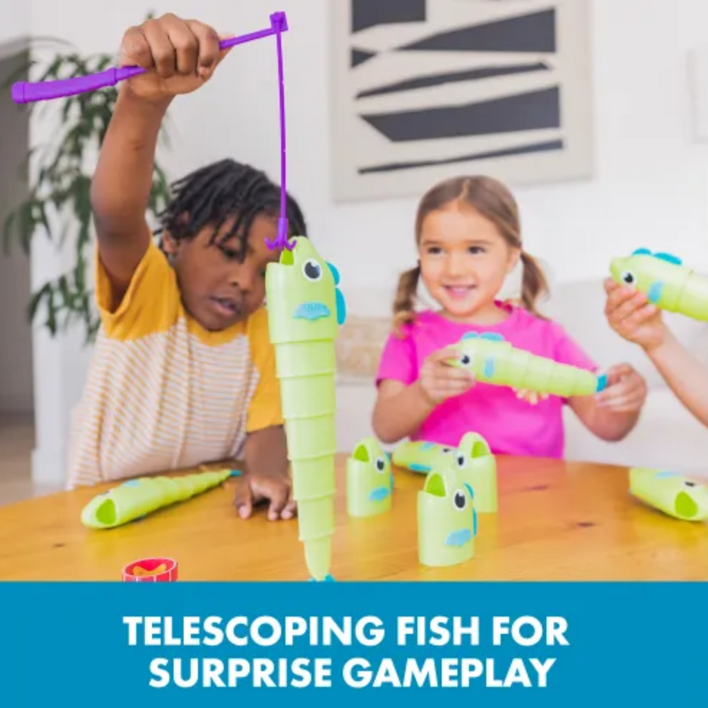 Children playing with telescoping fish toys on a table.