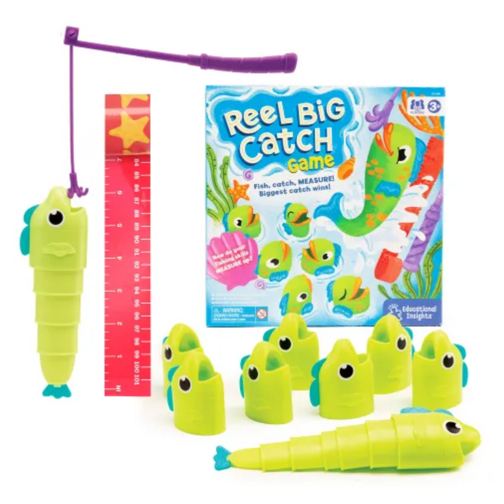 Reel Big Catch game set with fishing rod, toy fish, and packaging on a white background
