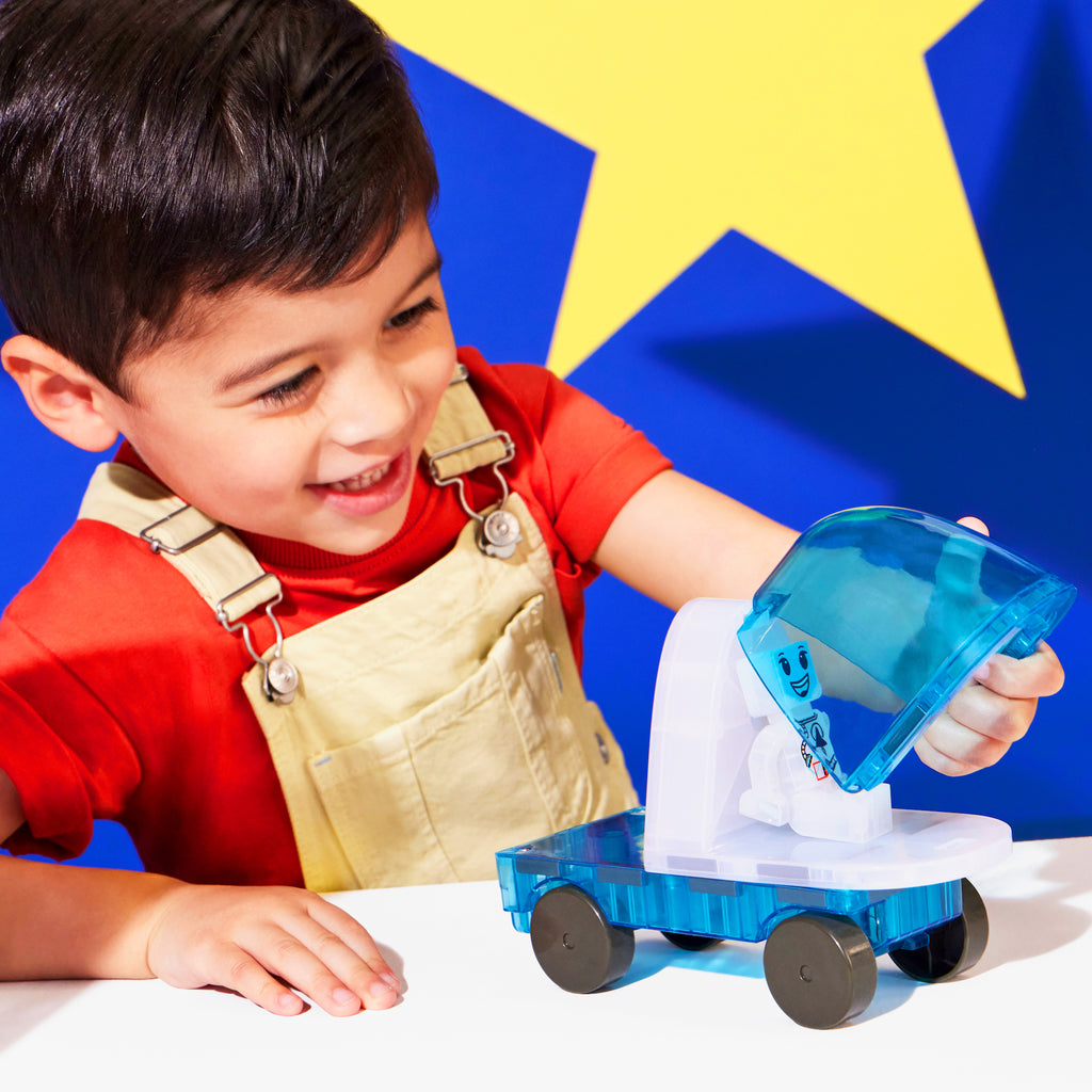 Child Playing with MagnaTiles Space 32 Piece Set