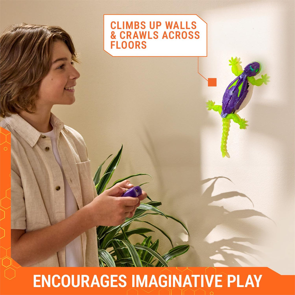 Child playing with a toy lizard that climbs walls, with text indicating its features and benefits.