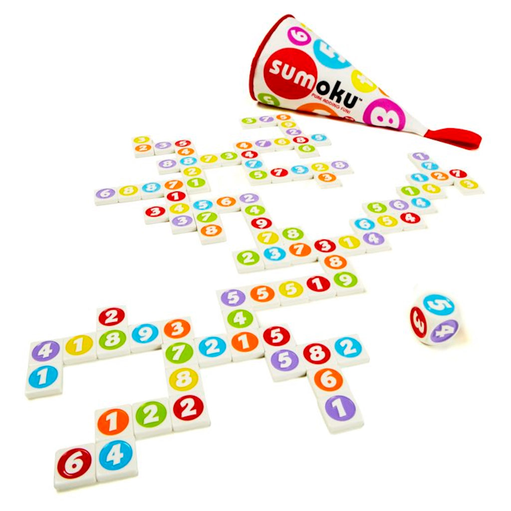 Sumoku game set with tiles and dice on a white background