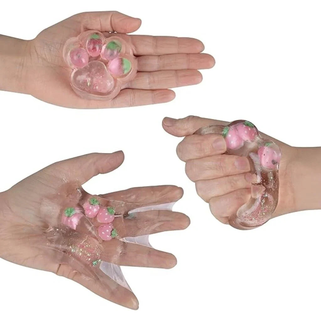 Hand Squishing Tabalicious Cat Paw