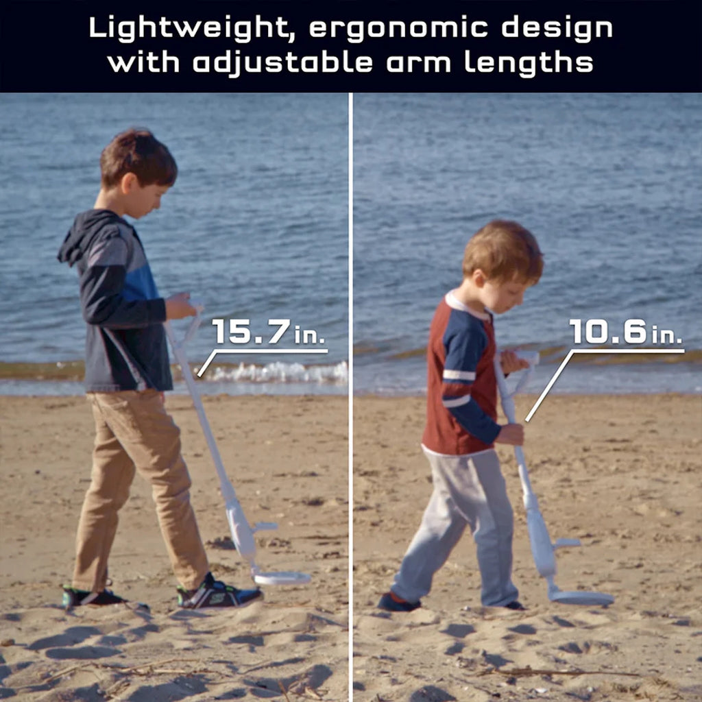 Two children on a beach using metal detector with adjustable arm lengths, labeled for measurement.