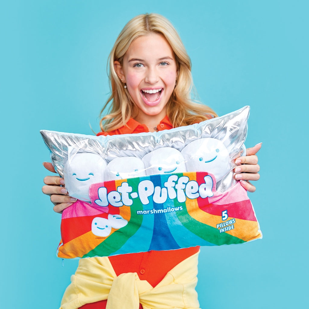 Girl holding Jet Puffed Marshmallow Plush 