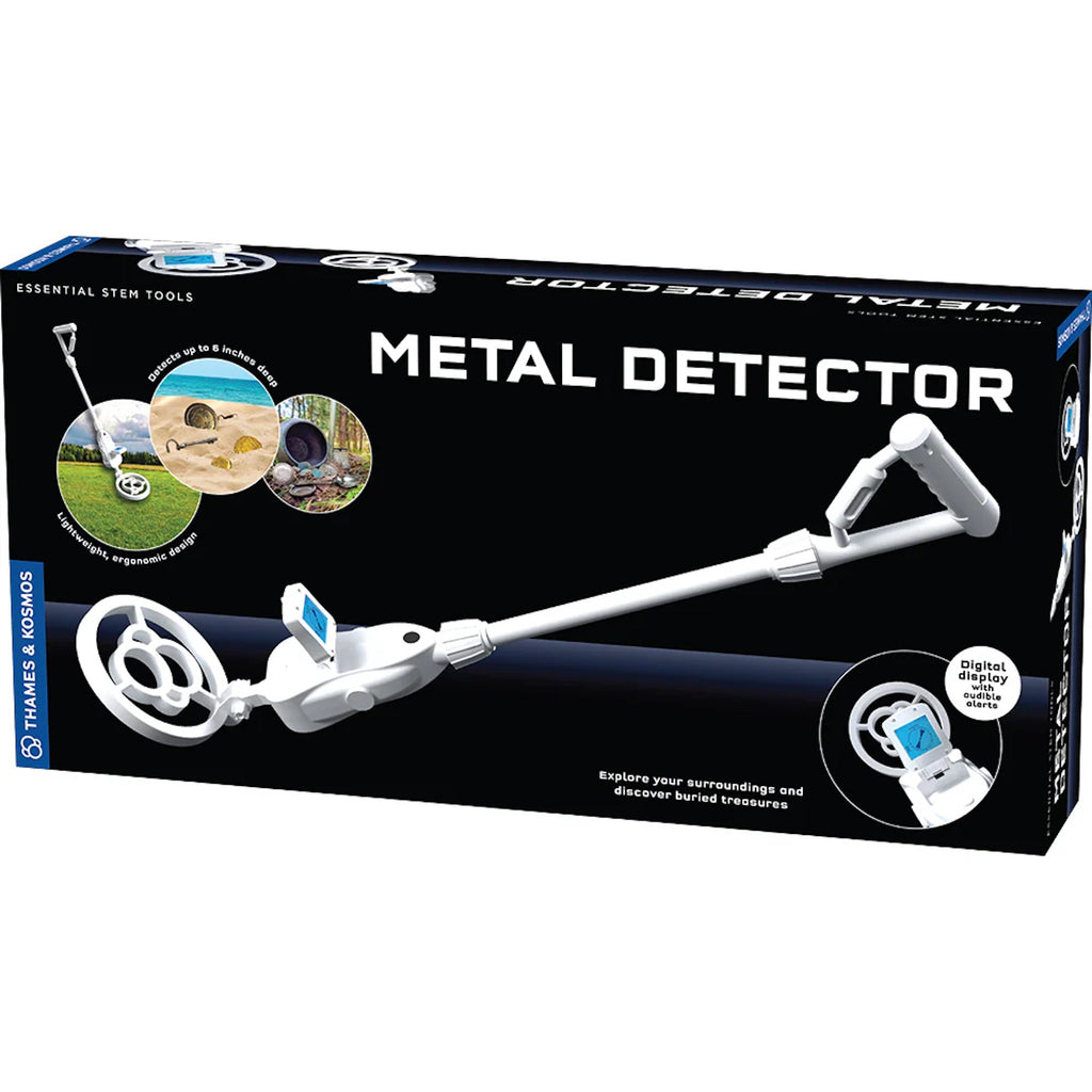 Boxed metal detector with small images of grass, sand & metals on a black box with a white background