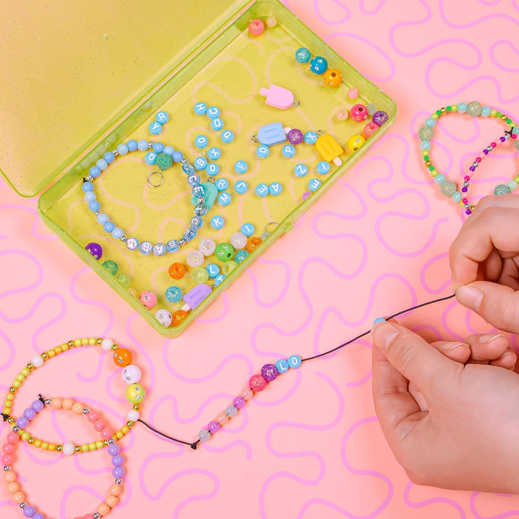 Girl making Ice Pop Bead Shop Bracelets