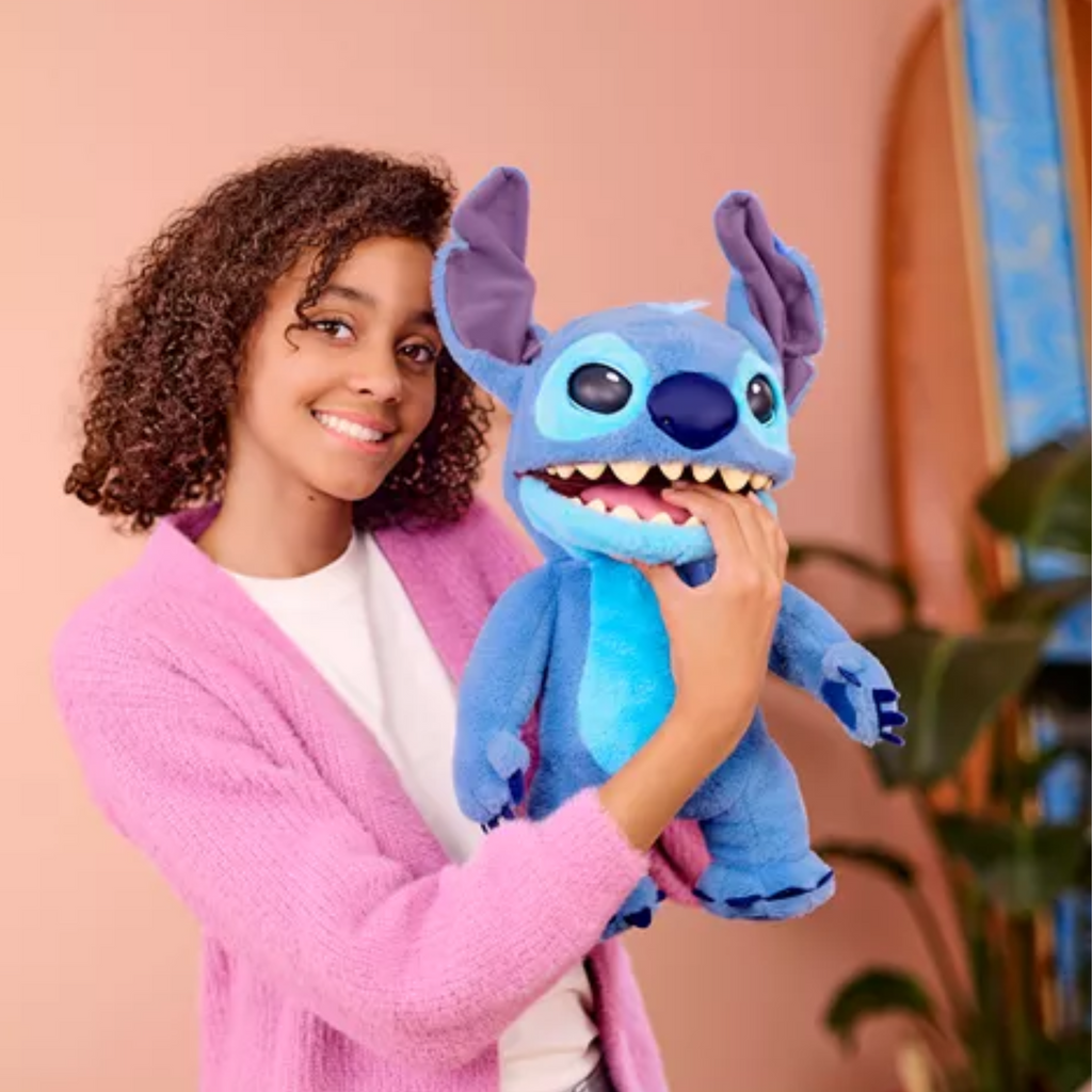 Child playing with Real Stitch FX Puppet