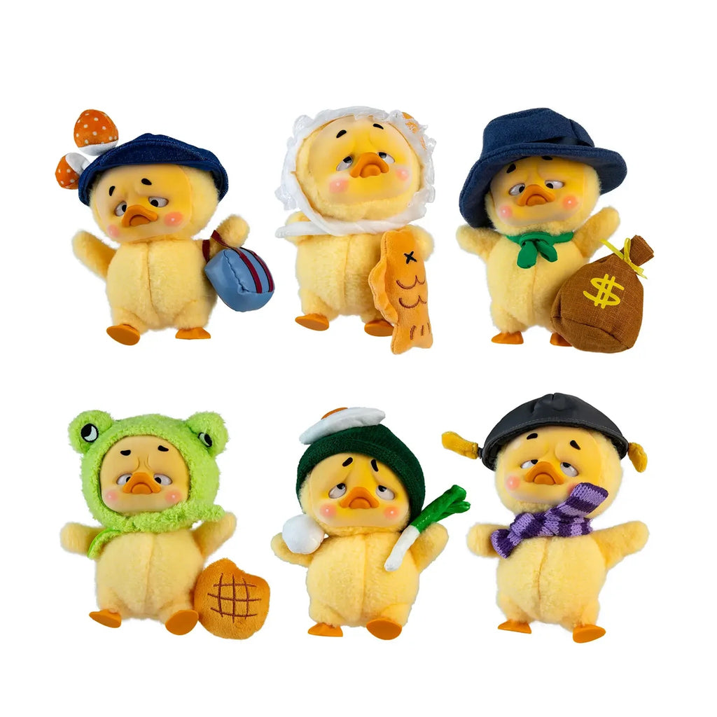 Set of six small plush toys in various costumes on a white background