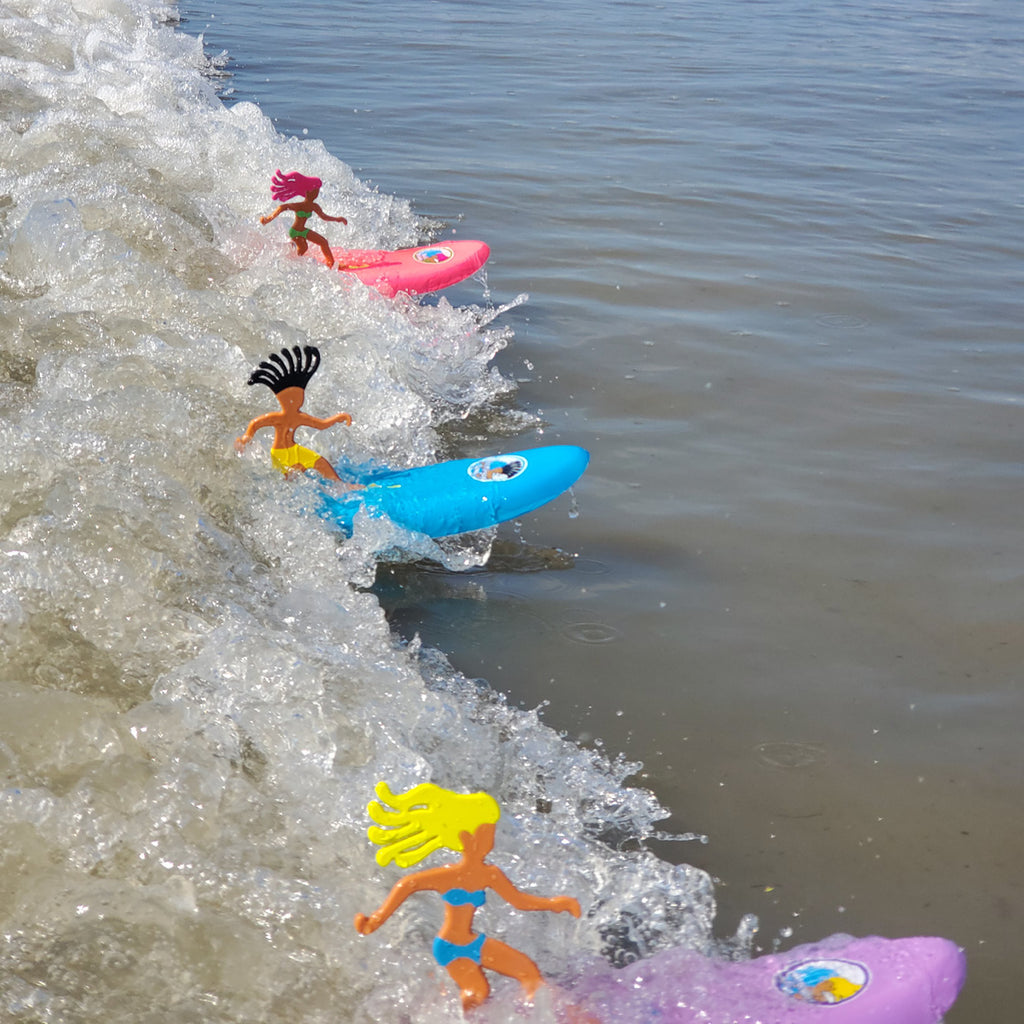 Surfer Dudes Riding A Wave 