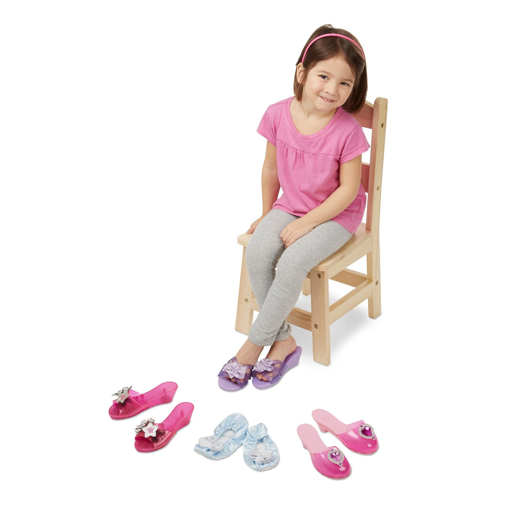 Girl Sitting Wearing the Dress-Up Shoes