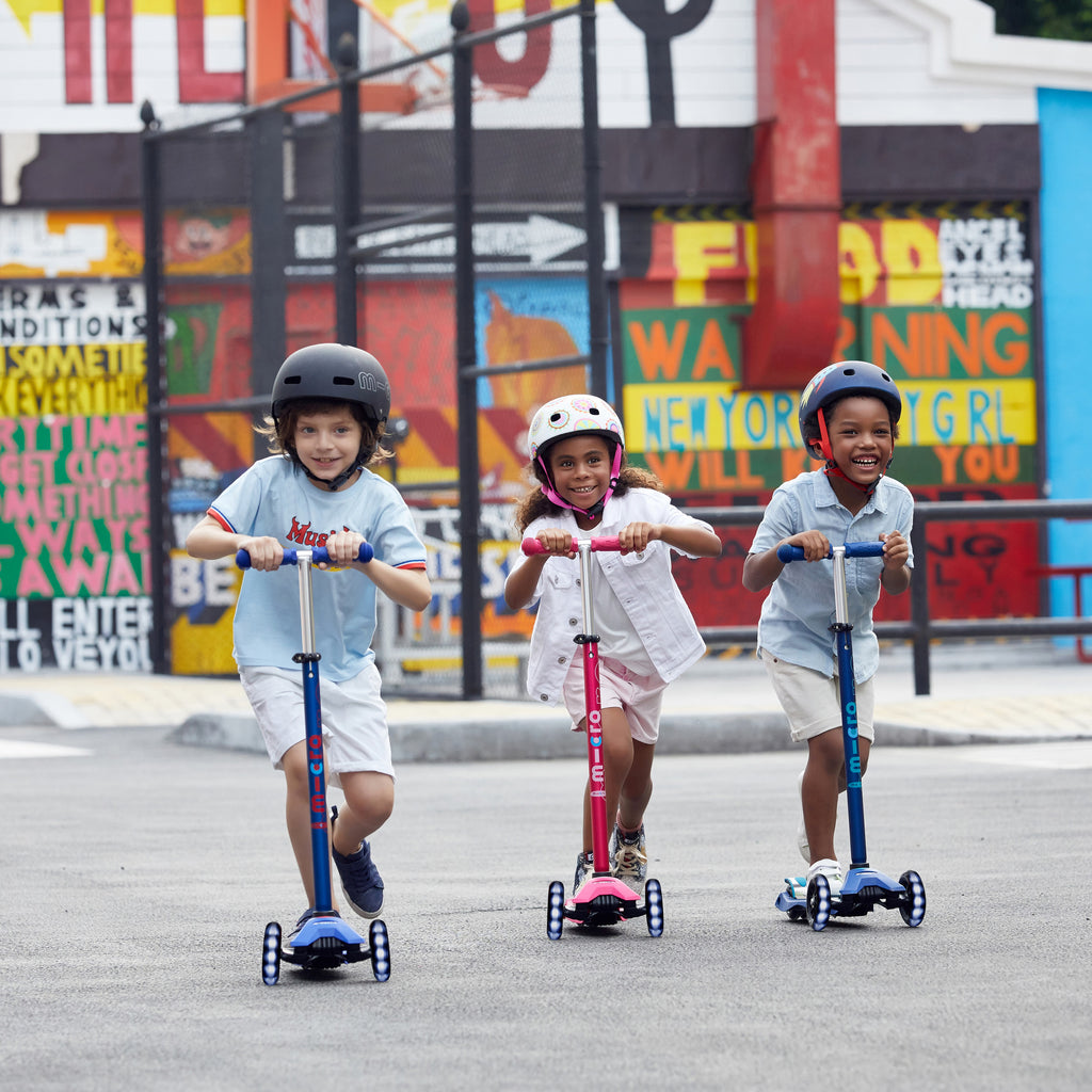 Kids Riding Maxi Scooters