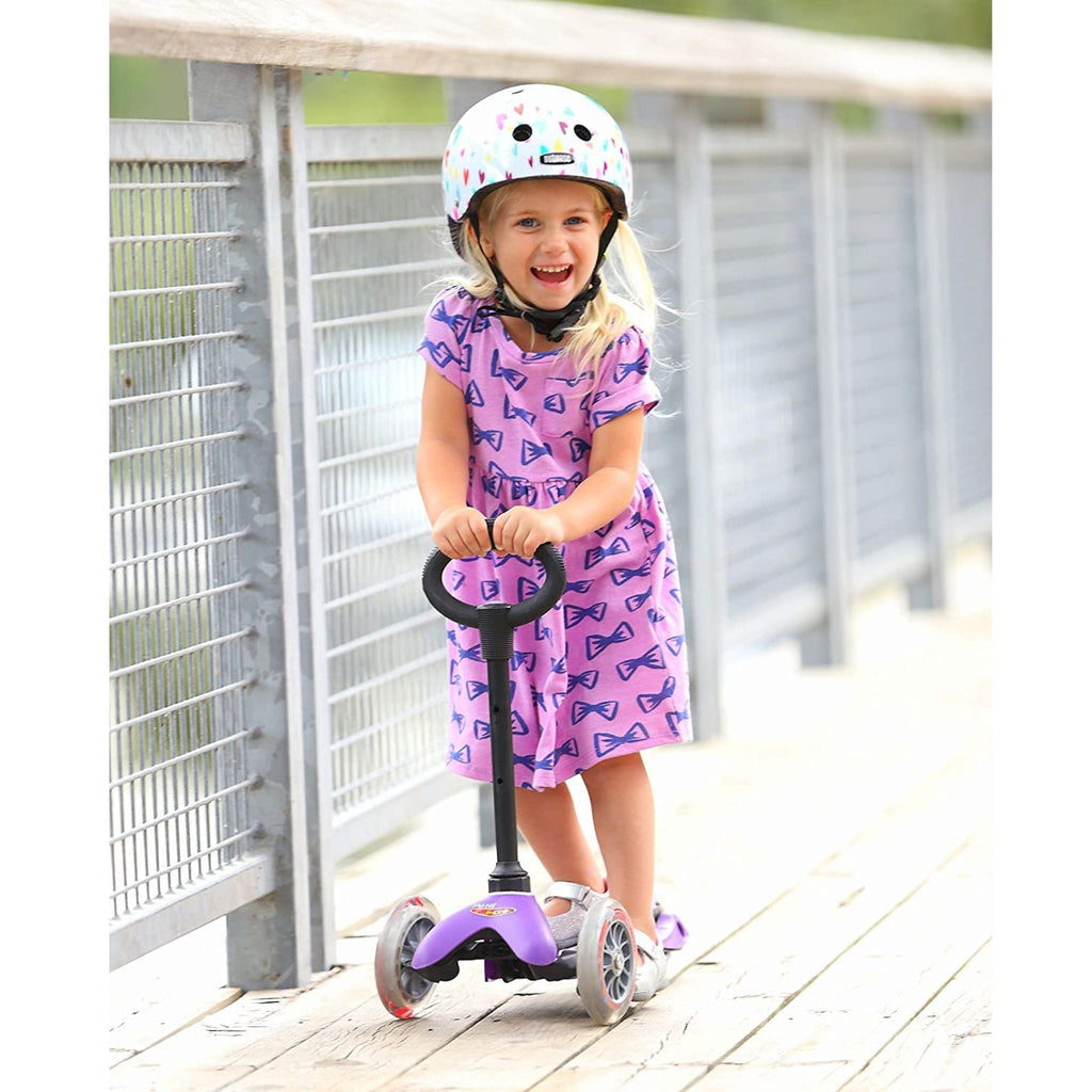 Girl Riding Mini Scooter