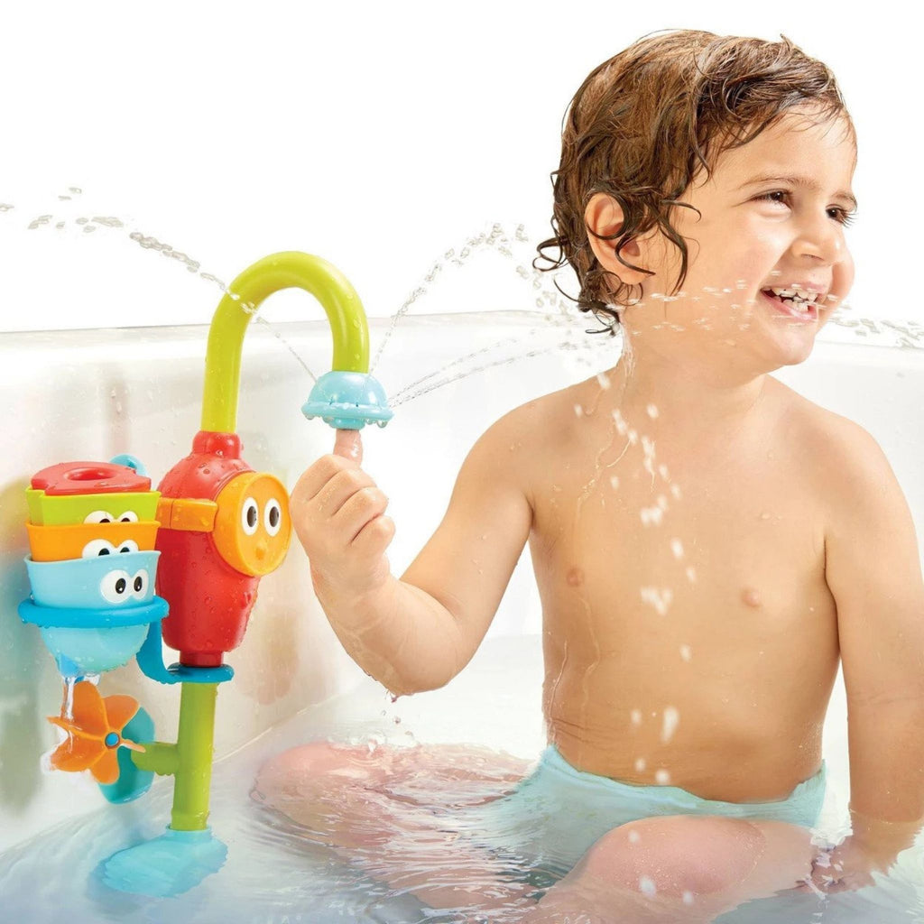 Child Playing with Flow 'N' Fill Spout in Bath Tub